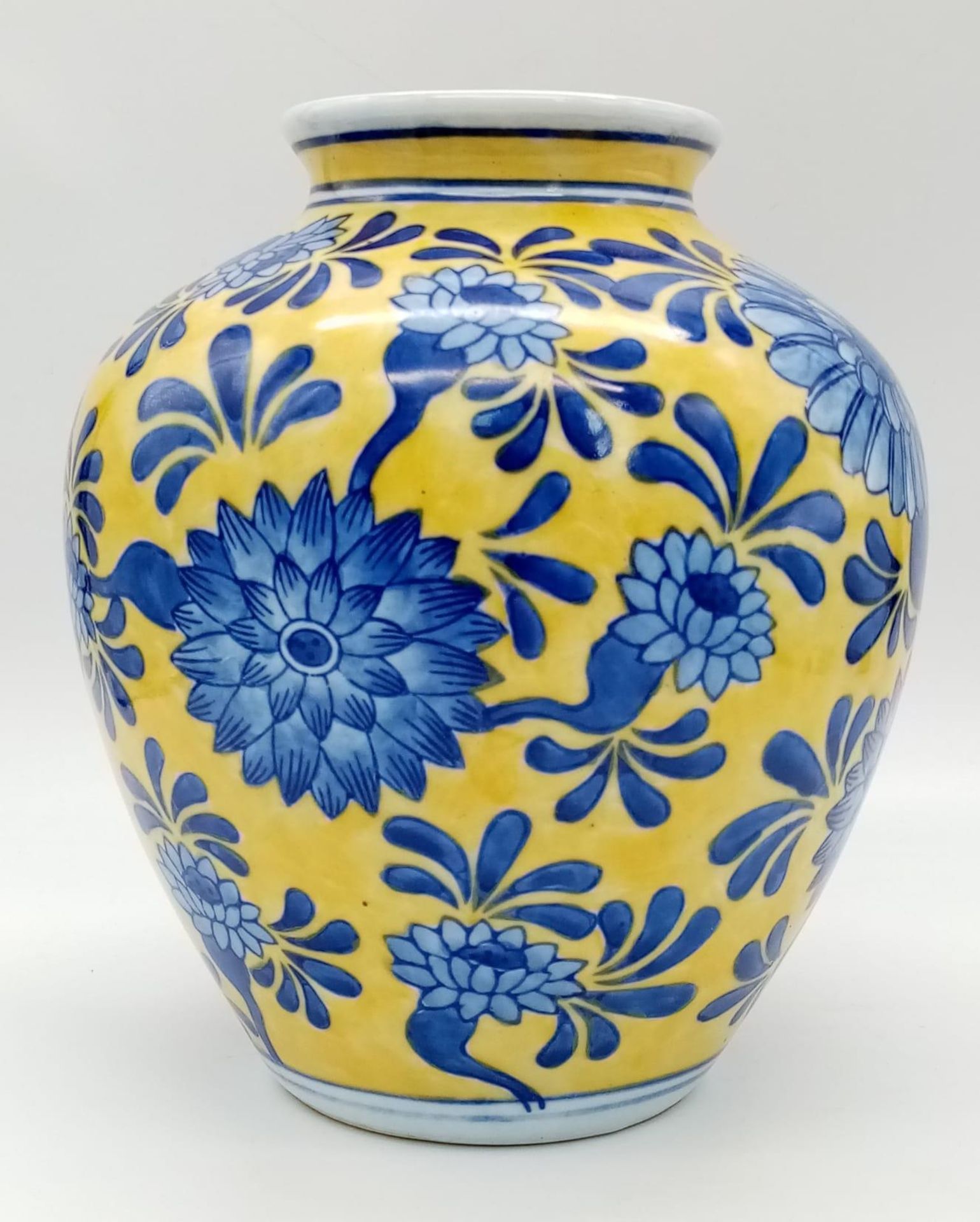 A Vintage Blue and Yellow Hand-Painted Vase. Faint makers mark on base. 21cm tall