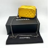 A Chanel Mustard Yellow Quilted Leather Coco Boy Shoulder Bag. Dual zippers, chain-link sling and