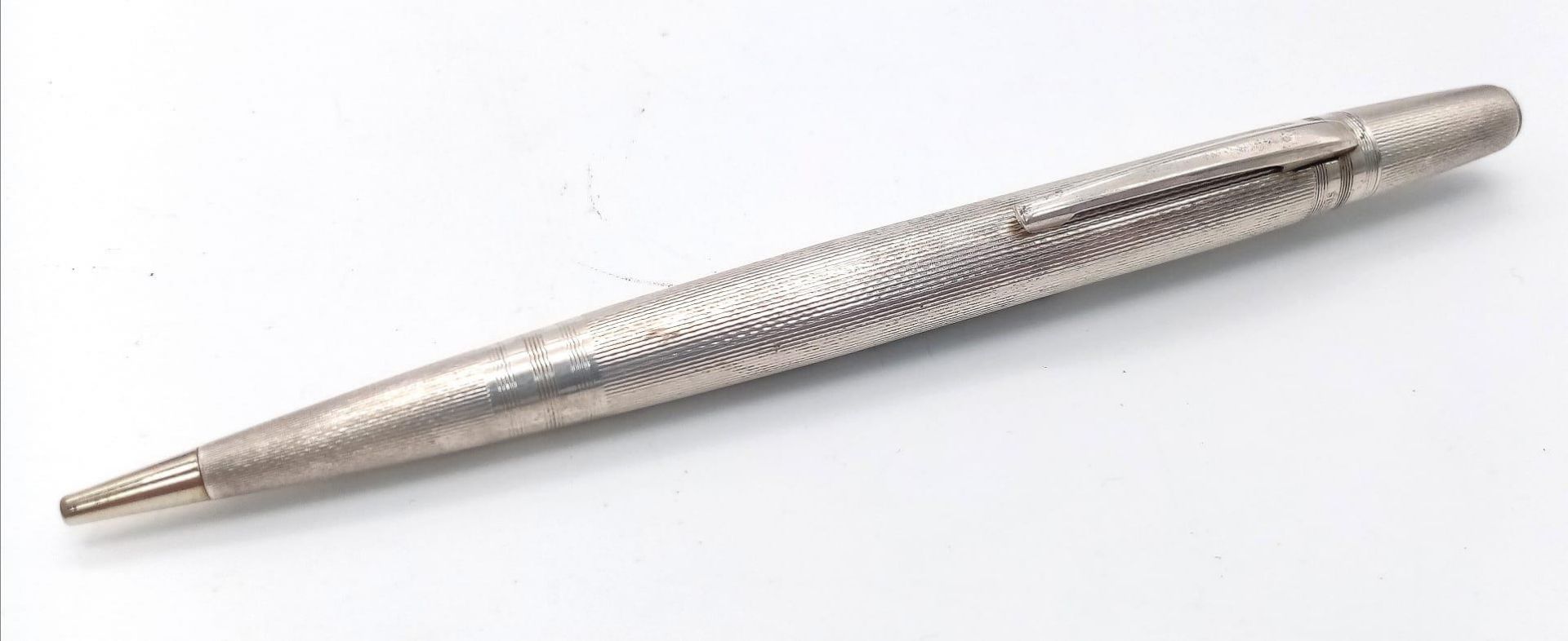 A Vintage Life Long Sterling Silver Propelling Pencil. Comes in original packaging. 20g