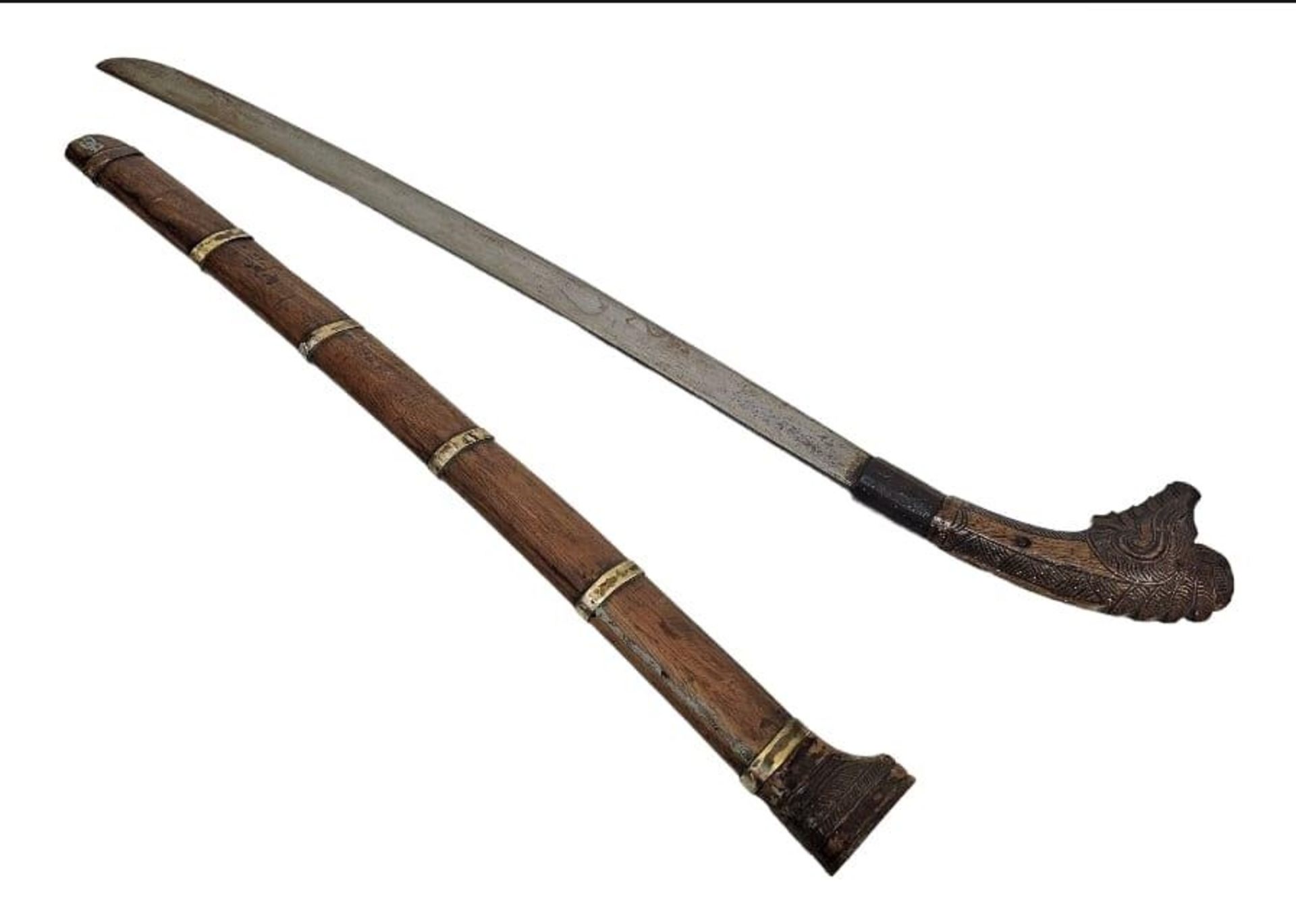 A Very Rare 19 th Century Oriental Short Sword with Wooden Hilt Carved as a Mythical Creature.