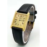 AN18K GOLD PIAGET TANK STYLE LADIES WATCH WITH GOLDTONE DIAL , ROMAN NUMERALS , QUARTZ MOVEMENT ON A