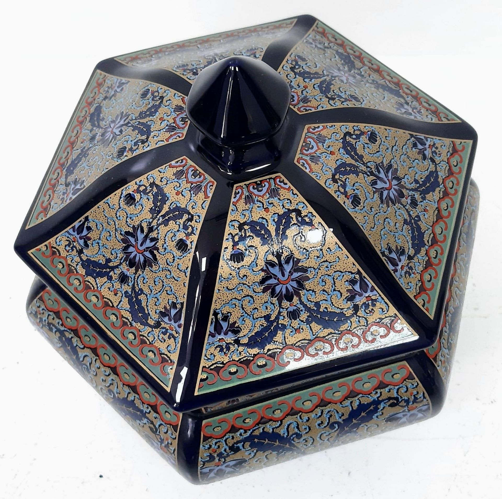 A glorious, six-sided, porcelain, lidded vase, with spectacular detailed decoration on a cobalt blue - Image 2 of 4