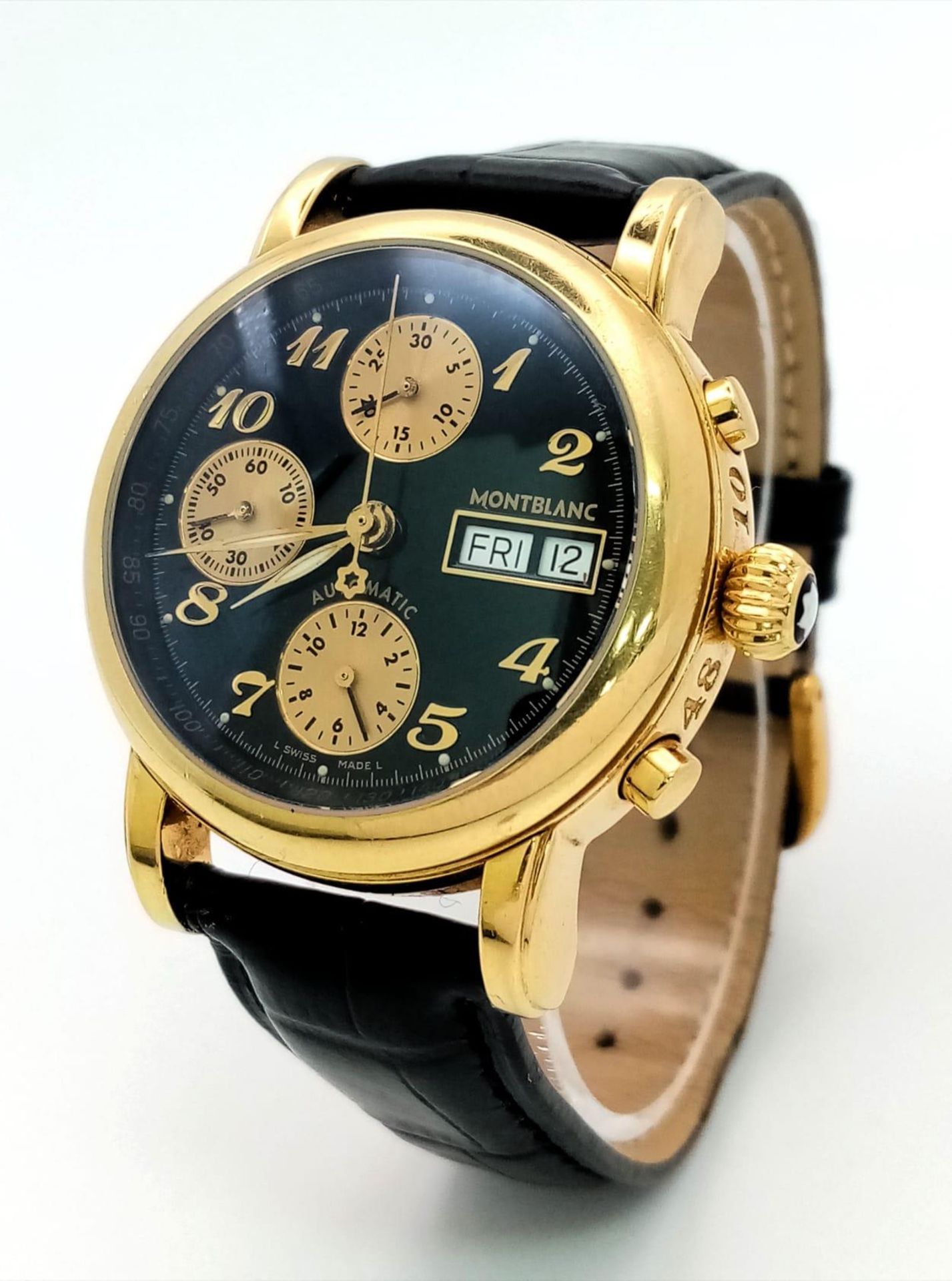 A MONTBLANC 18K GOLD GENTS CHRONOGRAPH WITH SKELETON BACK , 3 SUBDIALS , DATEBOX ON A BLACK