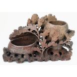 An antique, Chinese, hand carved, SHOUSHAN stone, double brush pot with a floral design. Dimensions: