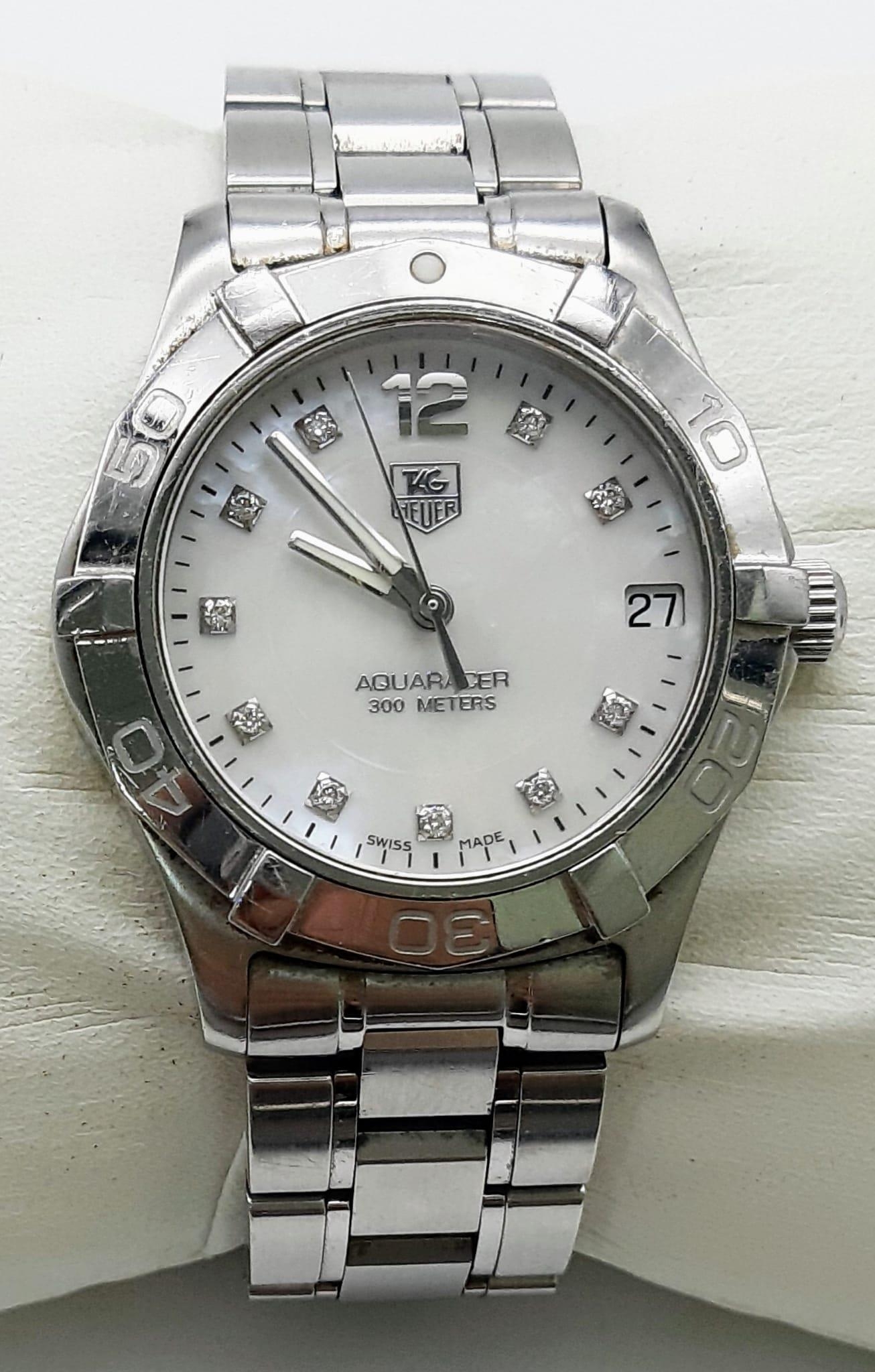 A Tag Heuer Ladies Aquaracer Diamond Watch. Stainless steel strap and case - 33m. Mother of Pearl