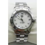 A Tag Heuer Ladies Aquaracer Diamond Watch. Stainless steel strap and case - 33m. Mother of Pearl