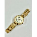 9ct gold trench watch with rolled gold strap 26mm case Working but sold with no guarantees