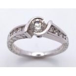 18K WHITE GOLD DIAMOND SOLITAIRE RING WITH DIAMOND SHOULDERS 0.50CT MAIN STONE WITH 0.25CT