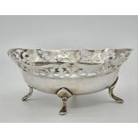 A 1929 Sterling Silver BonBon Dish with Pierced Decoration on Four Pedestal Feet. Hallmarks for