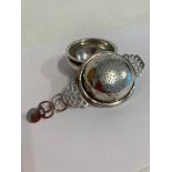 Antique SILVER TEA STRAINER With beautifully designed handle,Together with a Solid Silver Drip Bowl.