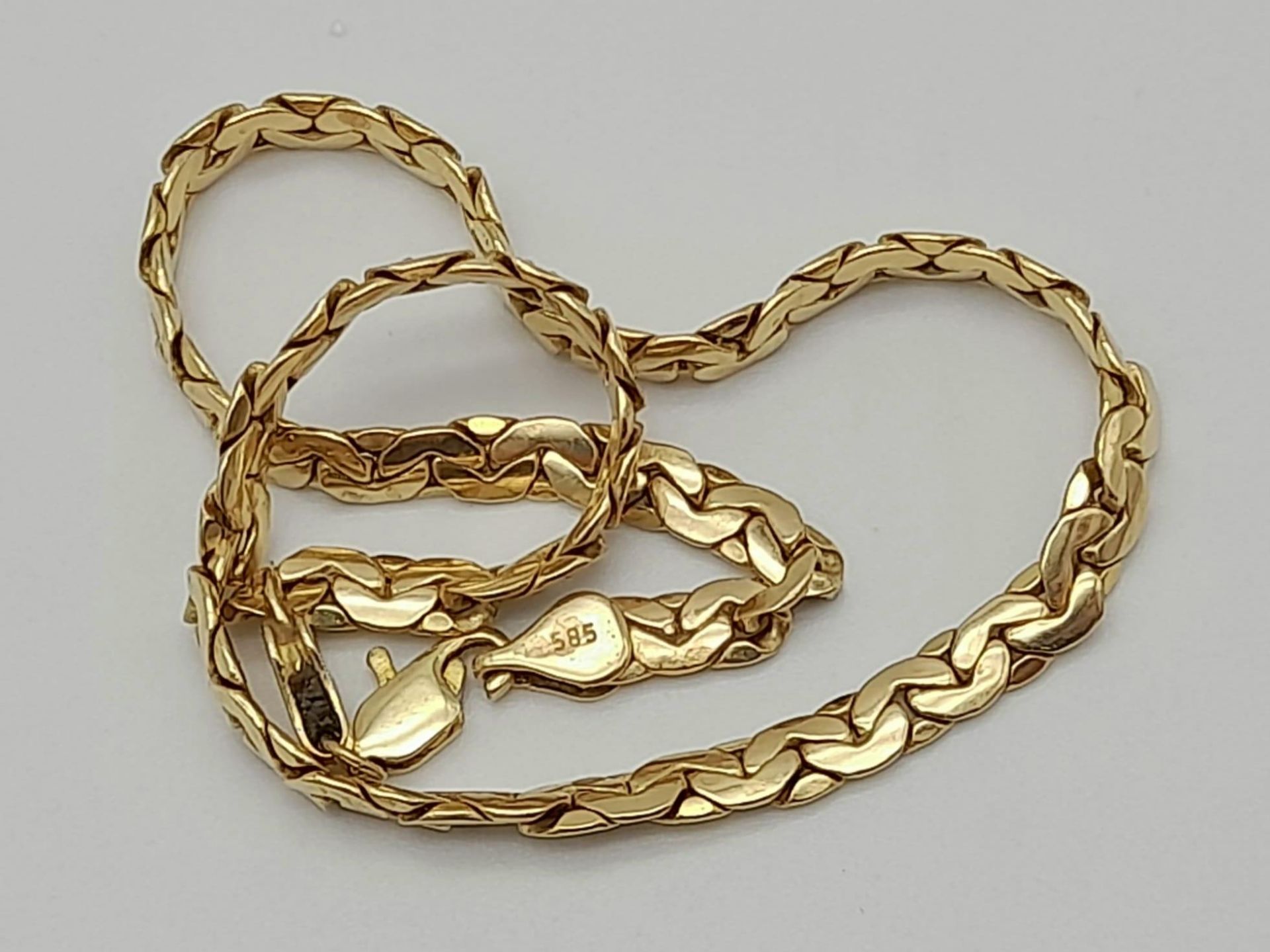 A 14K Yellow Gold Flat Tight-Curb-Link Long Bracelet. 27cm. 5.93g - Bild 4 aus 4