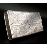 A Russian silver cheroot case, Andrey Kovalsky, Moscow 1855. Of purse form, finely engraved with
