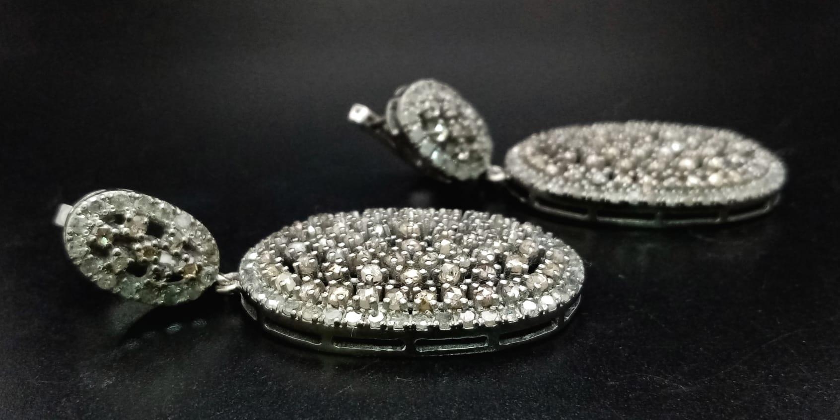 A Pair of Art Deco Style Old-Cut Diamond Cluster Drop Earrings in a 925 Silver Antique Finish. - Image 3 of 5