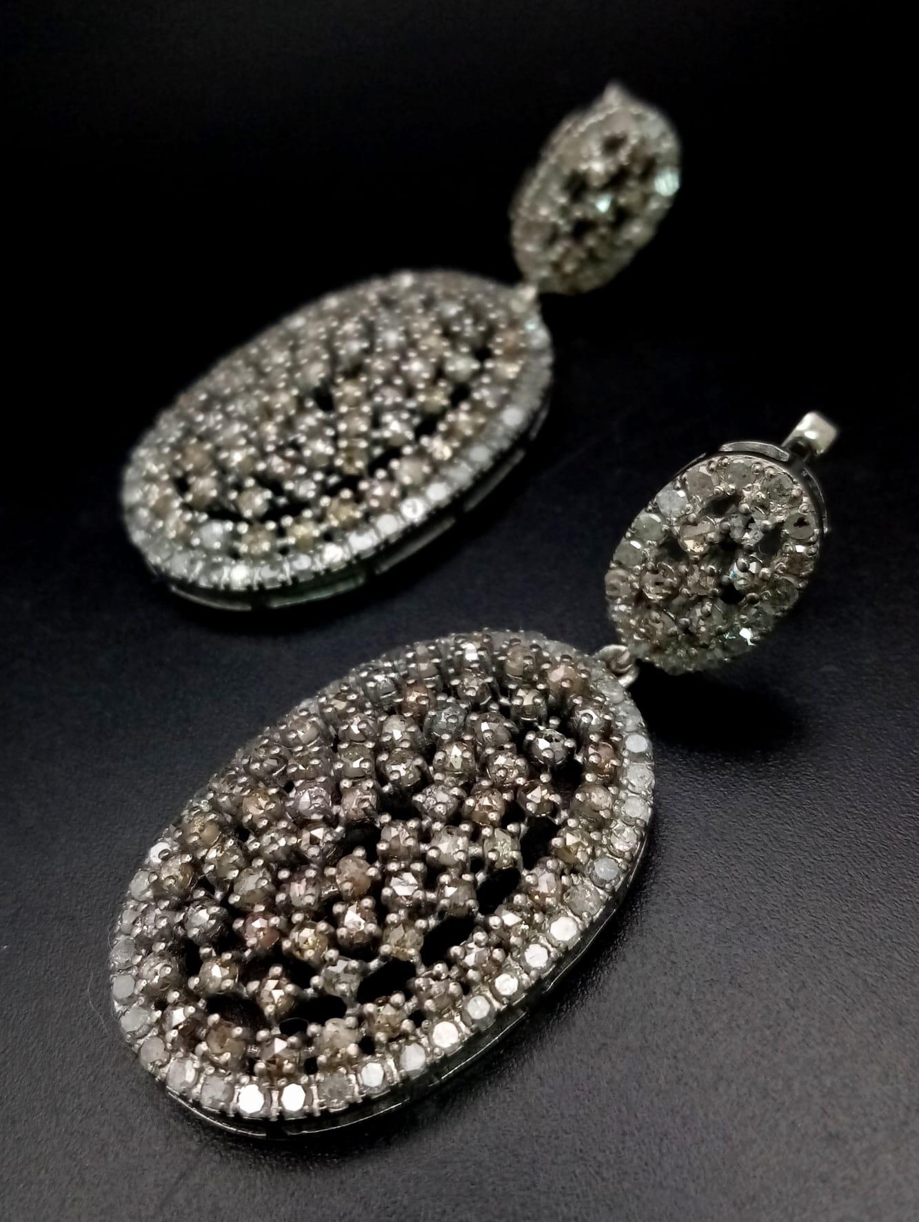 A Pair of Art Deco Style Old-Cut Diamond Cluster Drop Earrings in a 925 Silver Antique Finish. - Image 2 of 5