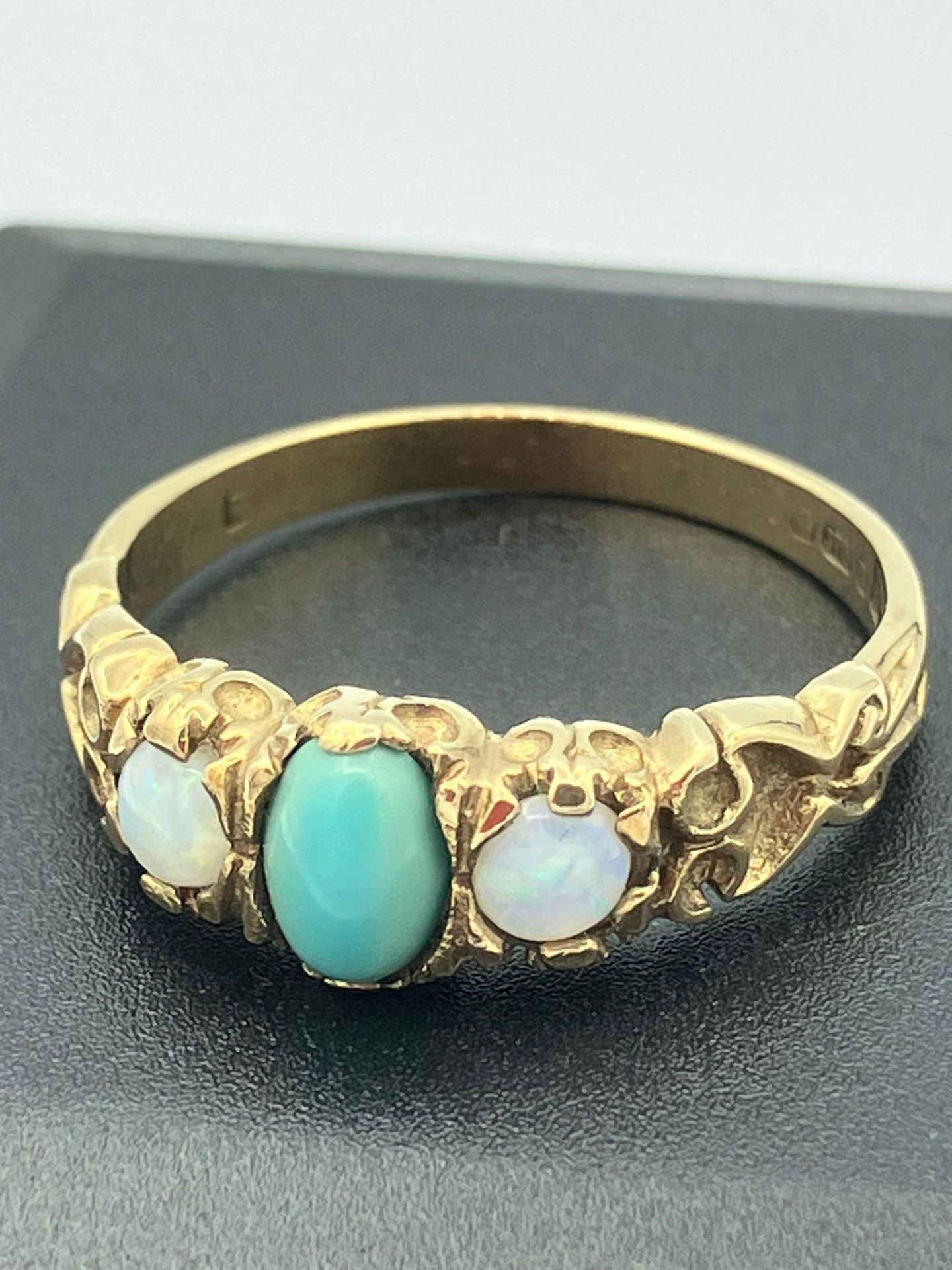 Hallmarked vintage 9 carat GOLD RING Having TURQUOISE and OPAL gemstones set to top. Complete with