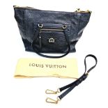 A Louis Vuitton Bleu Infini Monogram Leather PM Bag. Gilded hardware. Outer zipped compartment.