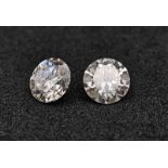 Two VVSI Top Quality Moissanite Lab-Made Gemstones. D colour brilliant round cut stones perfect