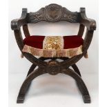 An Antique Carved Oak Bishops Chair with Original Cushion. This beautiful x-framed hand-carved