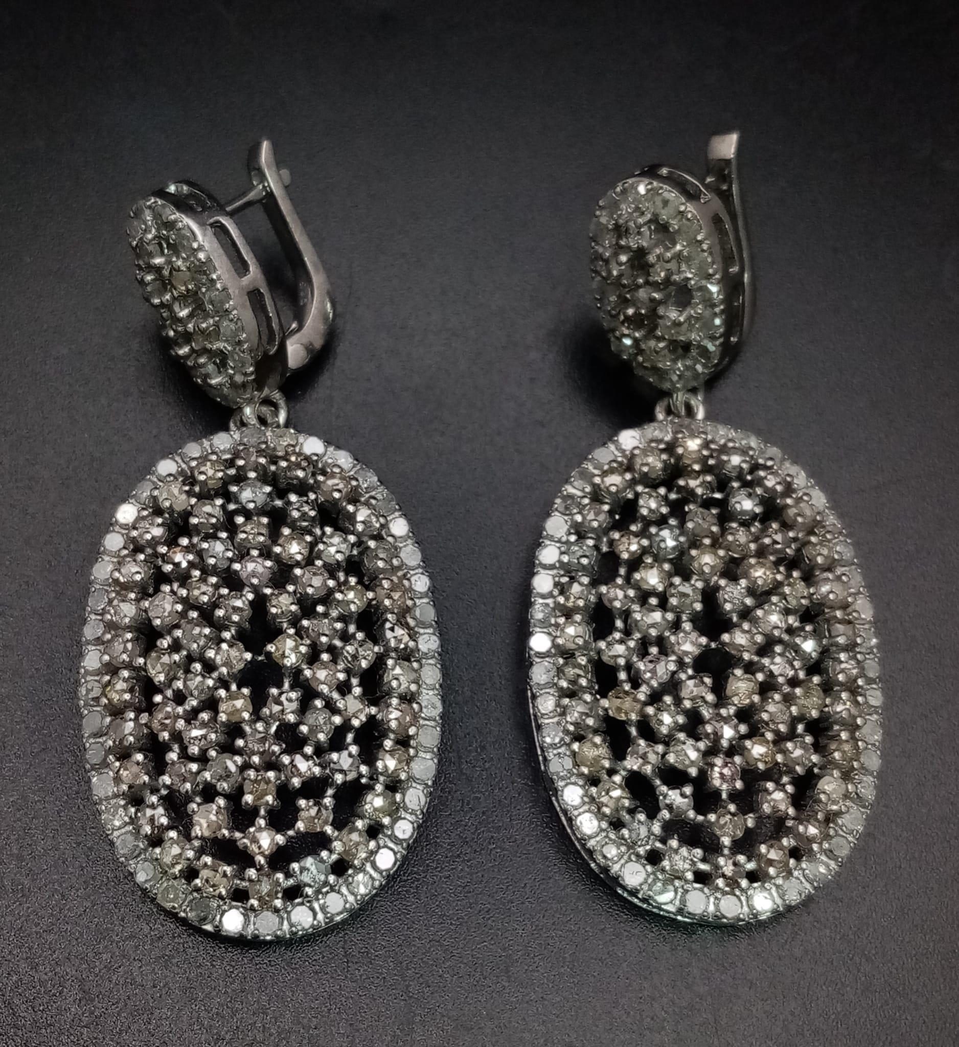 A Pair of Art Deco Style Old-Cut Diamond Cluster Drop Earrings in a 925 Silver Antique Finish.