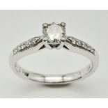 PLATINUM, FOREVER DIAMOND SOLITAIRE RING. 0.32CT WITH DIAMOND SHOULDERS. TOTAL WEIGHT 3.2G. SIZE M