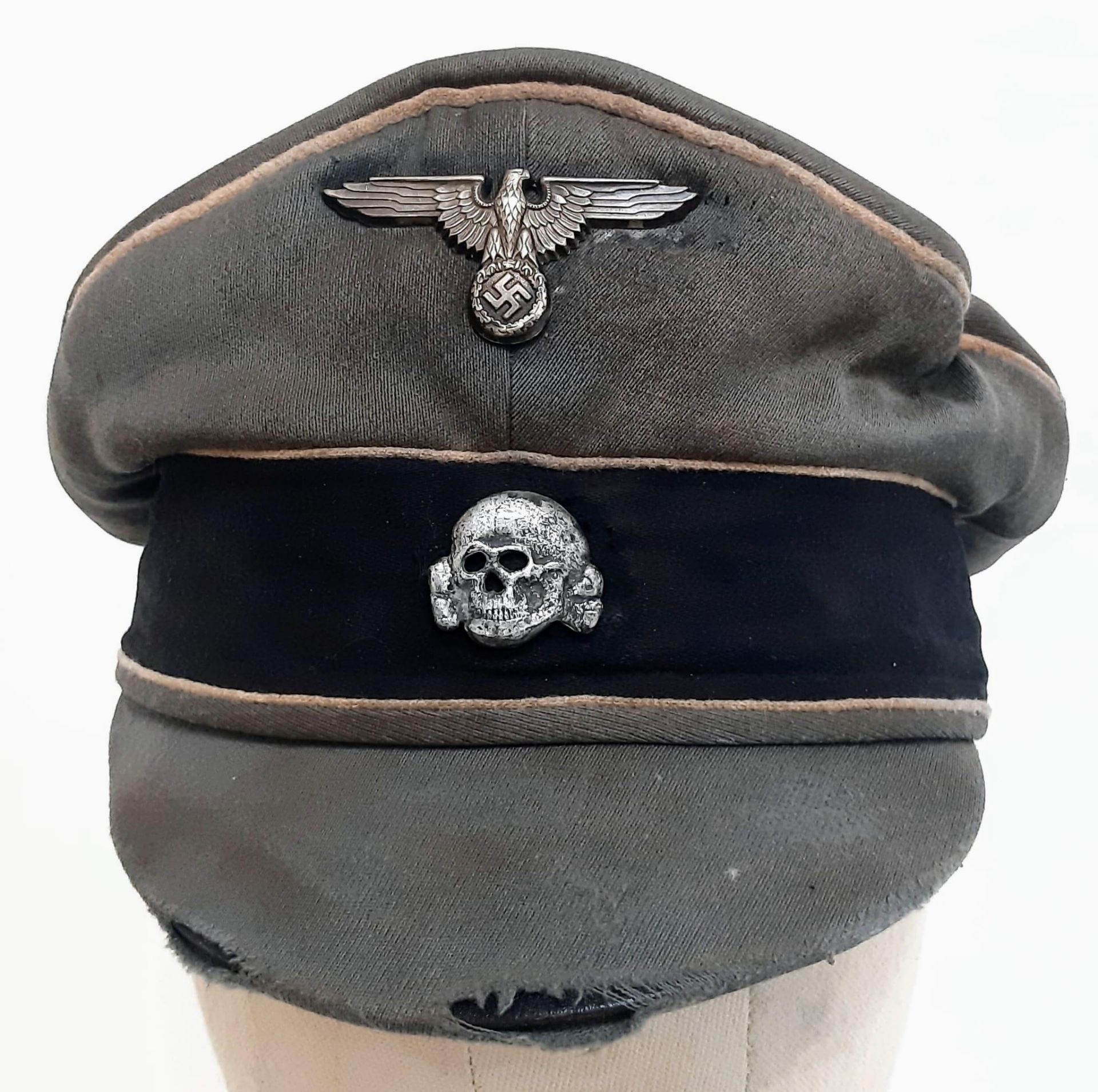 3rd Reich Waffen SS Trikot Crusher Cap with White Piping. A real “been there” example.