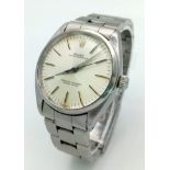 A STAINLESS STEEL OYSTER PERPETUAL ROLEX . 34mm