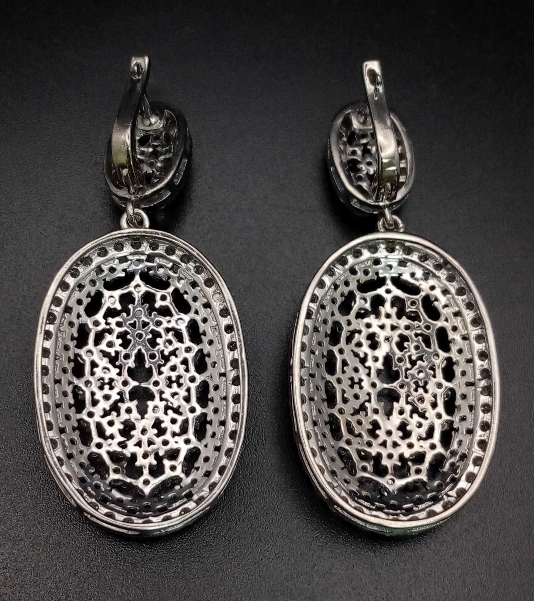 A Pair of Art Deco Style Old-Cut Diamond Cluster Drop Earrings in a 925 Silver Antique Finish. - Image 4 of 5