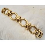 A very satisfactory to wear, substantial 9 K yellow gold fancy chain bracelet with a lobster clasp