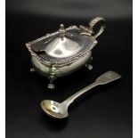 An Antique Sterling Silver Mustard Pot and serving spoon. Hallmarks for London 1917. Goldsmiths