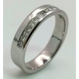 18K WHITE GOLD DIAMOND BAND RING. PRINCESS CUTS 0.40CT DIAMONDS. TOTAL WEIGHT 4.7G. SIZE M.