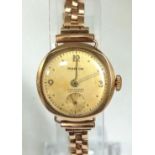 A 9K Yellow Gold Vintage Marvin Ladies Watch. 9K yellow gold bracelet and case - 22mm. Gold tone