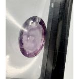 A 26.74ct Natural Oval Amethyst. AIG Milan Certified. Eye-clean clarity - Sealed Pack.