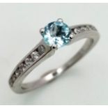 PLATINUM DIAMOND & AQUAMARINE RING. TOTAL WEIGHT 4.2G. SIZE N. 0.50CT ROUND AQUA. 0.20CT DIAMONDS