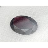 A 6.44ct Tanzanian Hessonite Garnet Gemstone. AGI American Lab Certified. Comes in a sealed