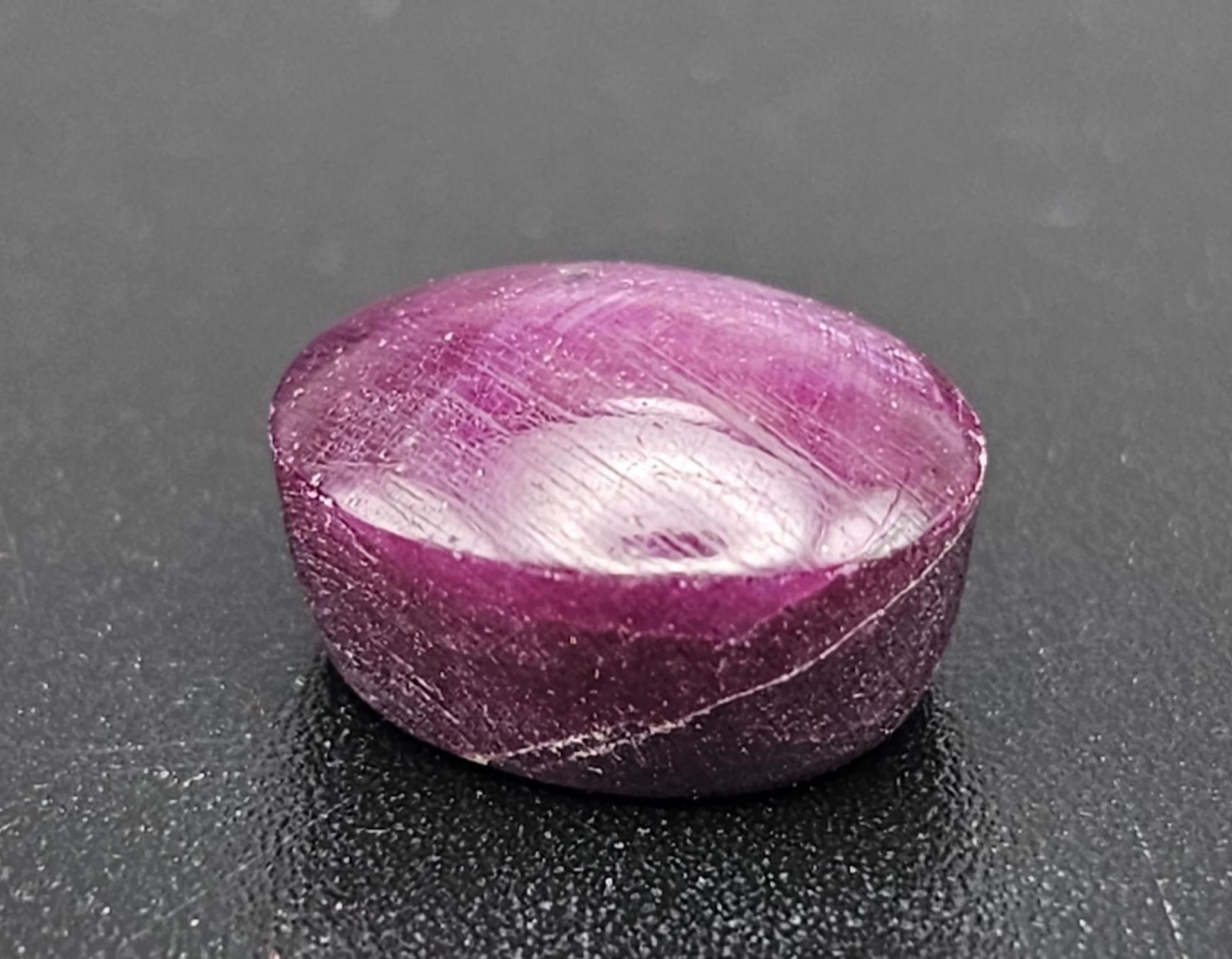 A 10ct African Untreated Natural Star Ruby. Oval Shaped. Comes with a GLI Certificate.