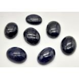 A 60.75ct of 7pcs Cabochon Blue Sapphire Gemstones, in Oval Cabochon Shapes .