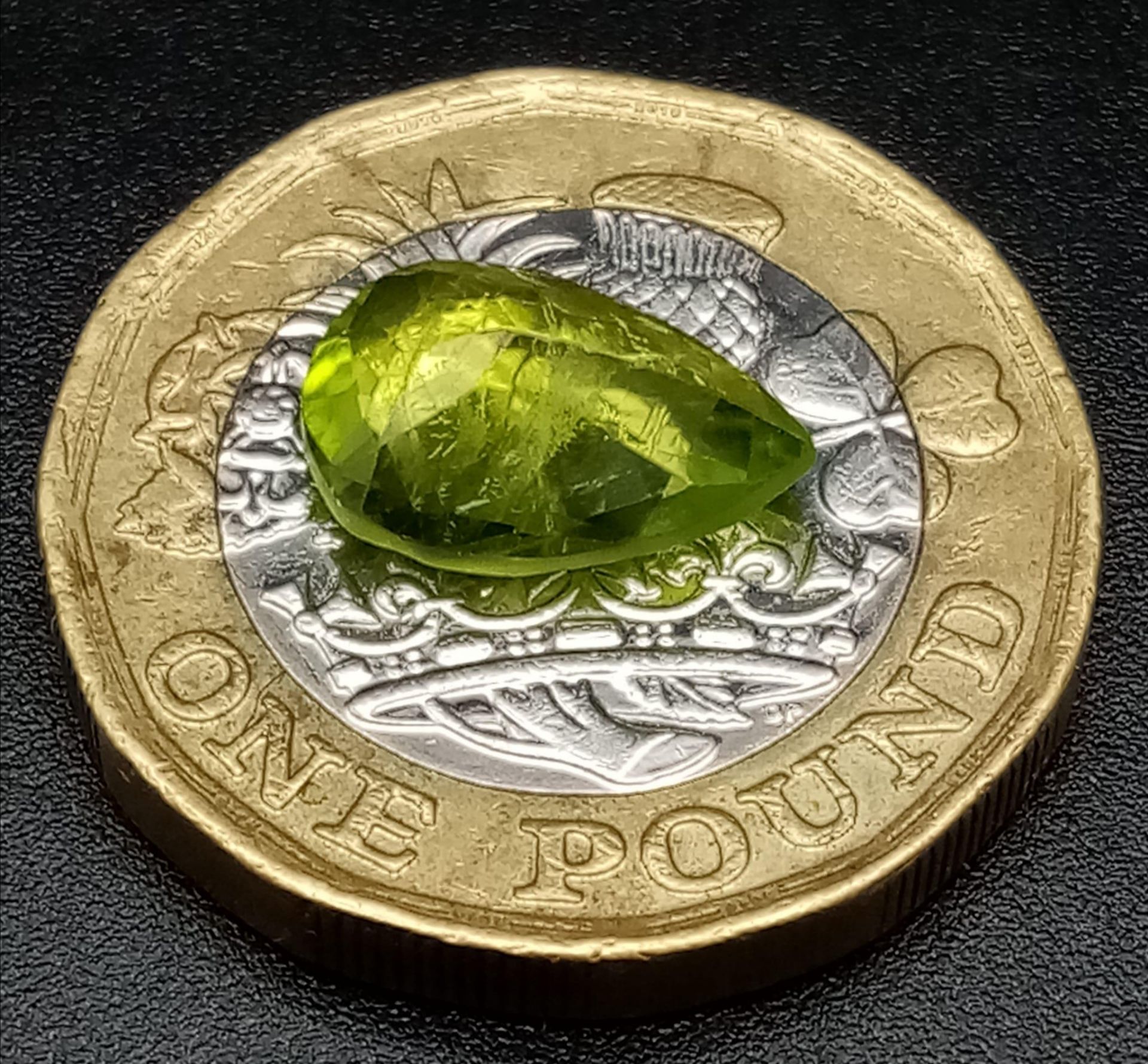 A 2.53ct Pakistani Peridot Gemstone. Pear shaped and comes with a GFCO Swiss Certificate. - Image 3 of 4