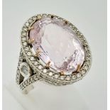 18K White Gold Oval Mixed Cut 13.90ct Kunzite Ring with 123 Round Brilliant Cut Natural Diamonds.