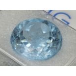 A 9.80ct Round Brilliant Blue Topaz Gemstone. Comes with AIG Milan Certification - Sealed Blister