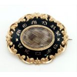 An Exquisite Victorian High-Karat and Black Enamel Mourning Brooch. 1870 inscription on back. This