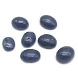 A 59.30ct of Cabochon Blue Sapphires Lot, in the Oval Shapes cut. The lot include 7 pieces of