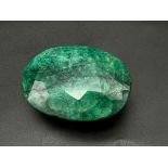 A 386.20ct Natural, Oval shaped, Earth Mined Emerald. Comes with GLI Certificate.