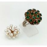 A very unique interchangeable Ring ( Able to change the top between Pearls and Emerald - screw