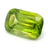A Rare 9.97ct Pakistani Peridot. Cushion cut with no inclusions. Comes with a GFCO Swiss