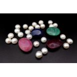 A mixed lot of faceted ruby and emerald and Cabochon Pearl Gemstones in total of 92.70ct