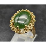 A Fine polished cabbage leaf Jade ring set in 14K gold. Size P. 5.83g total weight.