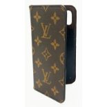 A Louis Vuitton Monogram Phone Case. 8cm x 16cm. Please see photos for conditions.
