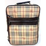 A BURBERRY "CARRY ON" SUITCASE WITH CLASSIC BURBERRY LIVERY. 36 X 52cms