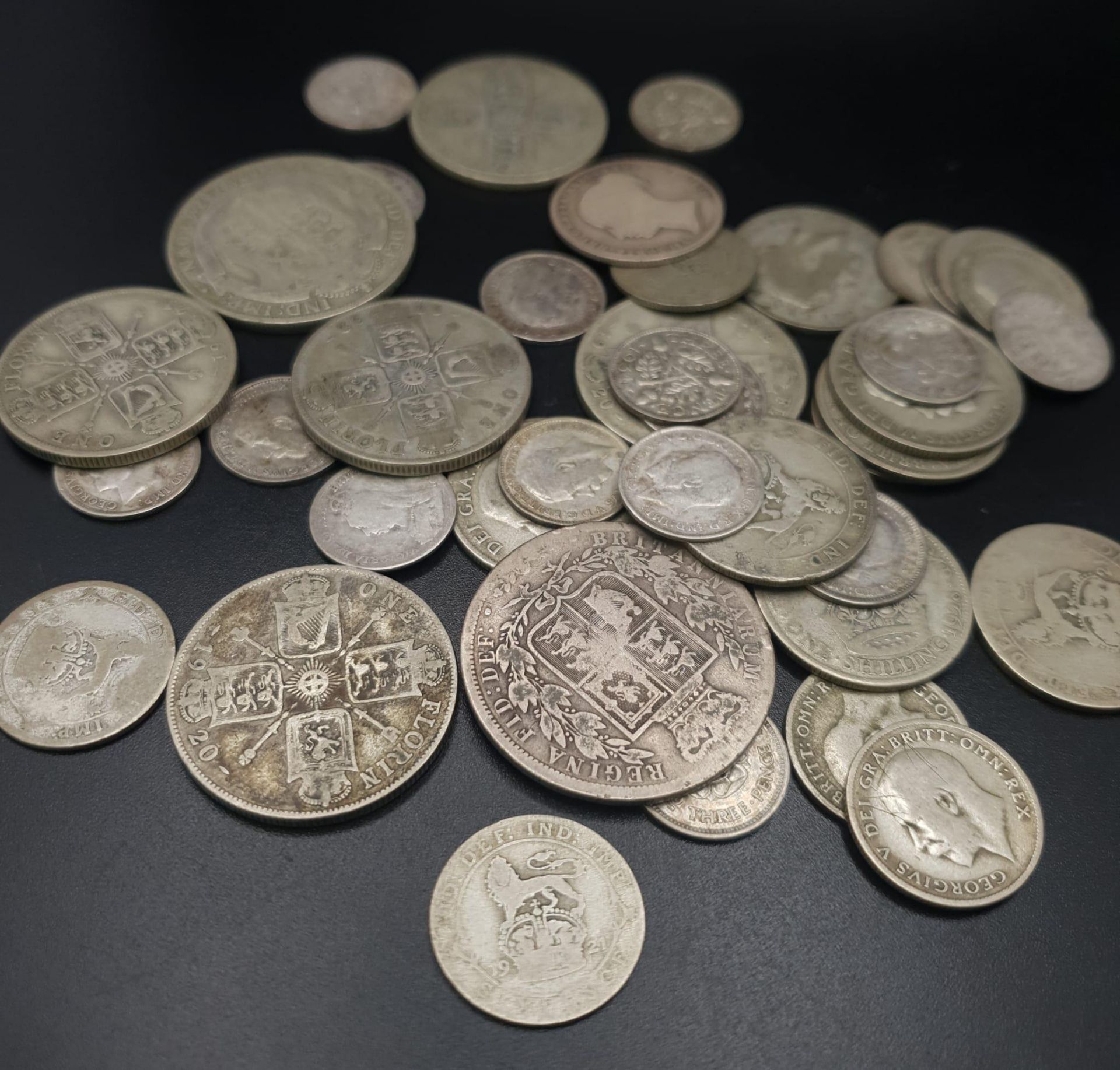 A Small Collection of Pre 1947 Silver Coins. 170g total weight.