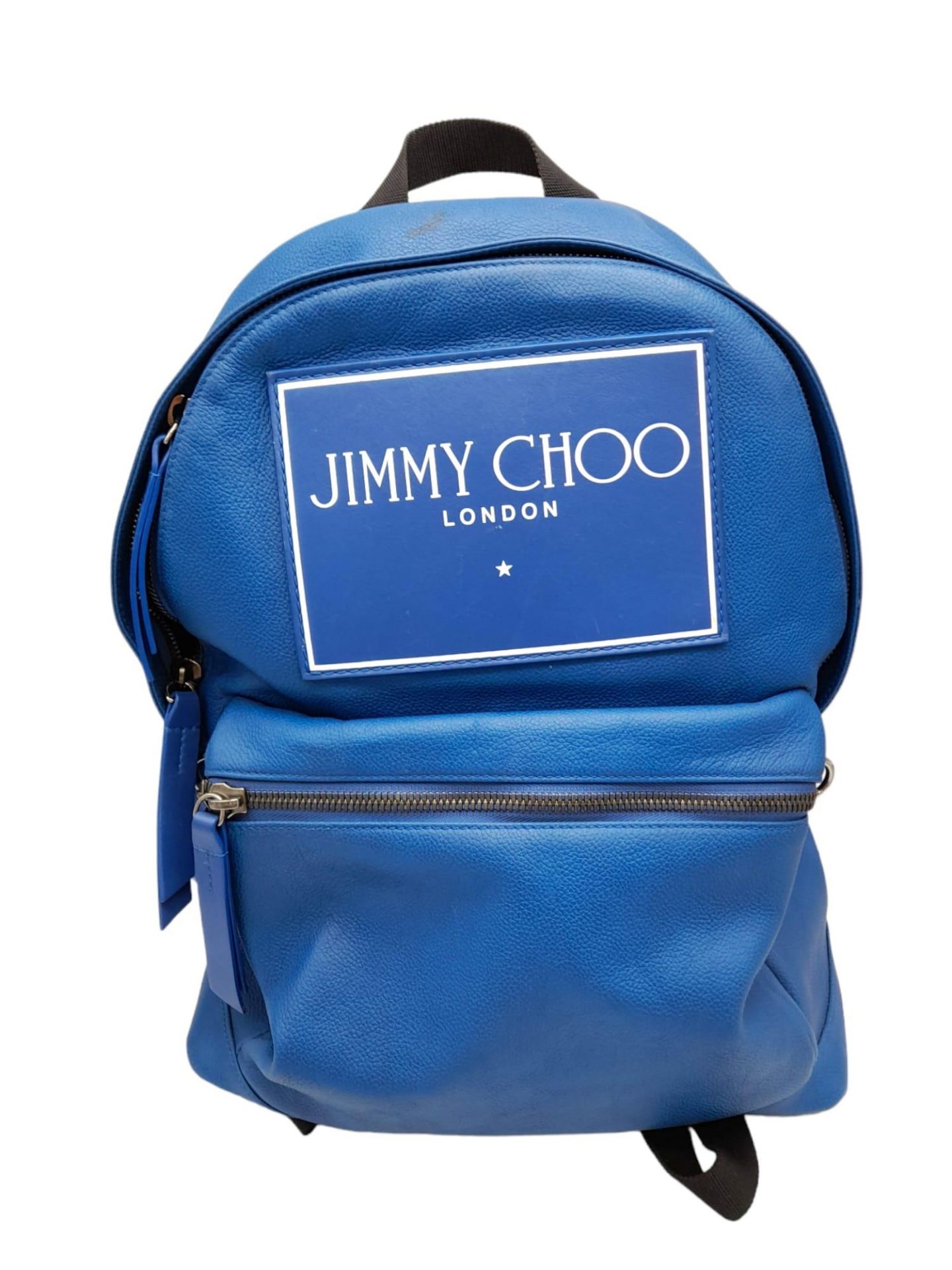 A Jimmy Choo Blue Leather Backpack. Exterior pocket. Tough textile shoulder straps. Spacious